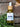 Megan & Co. Revival Hair Oil bottle with dropper on a stone background