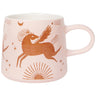 A light pink ceramic mug featuring a brown celestial Pegasus, sun, and moon design, paired with a Megan & Co. stainless steel mesh tea strainer.