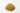 A smooth, rounded mound of fine-textured, light brown dandelion root powder centered on a clean white surface.