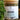 Glass jar of Megan & Co. Honest Tox tea blend with a wooden lid on a blurred natural background.
