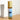 Megan & Co. Bouquet roll-on bottle on a wooden surface with a white background