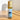 Roll-on bottle of Megan & Co. Purify on a wooden surface with a neutral background