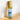 Bottle of Megan & Co. Green Clean on a light surface with a white background