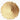 A circular, top-down view of finely ground maca root powder, featuring a uniform light-tan to sandy-beige color with a smooth, matte texture.
