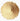A circular, top-down view of finely ground maca root powder, featuring a uniform light-tan to sandy-beige color with a smooth, matte texture.