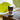 A 2.3ml (5/8 dram) amber glass vial of Megan & Co. Woods essential oil on a wooden surface with a blurred leaf background, featuring a grounding blend of Organic Fir Balsam, Spruce, and Cedarwood.