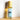Megan & Co. Prosperity roll-on bottle on a wooden surface with a white background