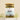 A glass jar containing loose leaf sleep aid herbal tea blend, labeled 'MEGAN & CO: Slumber.  