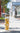 Clear glass bottle with a brown lid on a sidewalk with blurred background