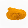 A vibrant, golden-orange mound of finely ground turmeric powder, placed on a clean white background.