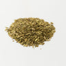 A small, centered mound of whole, greenish-tan fennel seeds showing their characteristic ridged, oval shape on a plain white surface.