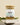 Megan & Co Winter Warmer Tea Blend in a glass jar displayed on marble stone with herbal stems