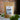 A package of 'Megan & Co. Focus Tea Blend' with a net weight of 1 oz, displayed in front of a brick wall background.